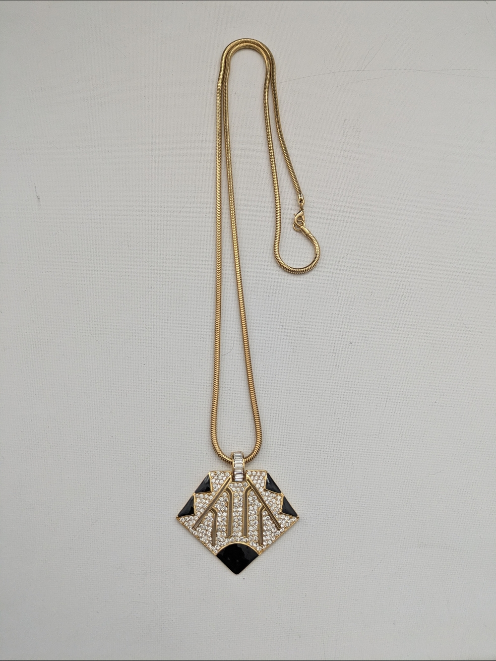 Oscar De La Renta Gold Plated Pendant Necklace with Black Accent Stones
